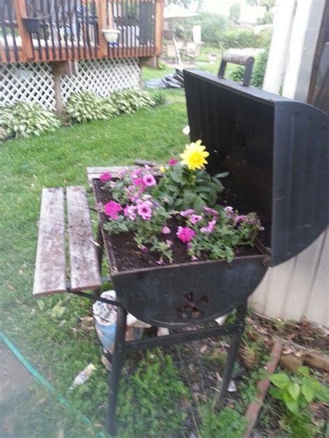 My Old Grill ~ Turned Into A Planter Wheelbarrow Garden Tools