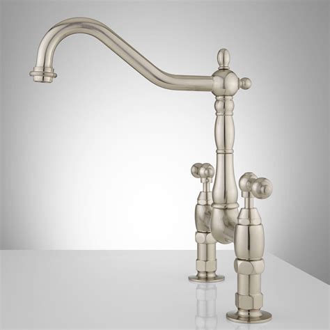 Julia two hole bridge articulated kitchen faucet, metal cross handles and spray. Kohler Parq Bridge Faucet With Spray