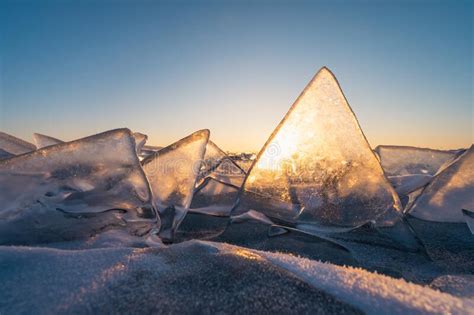 Sunrise Sky And Ice On Frozen Lake Baikal Winter Season In Siberia