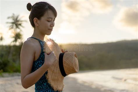 Woman Relaxing On The Beach With Sunrise In Koh Kood Island Stock Image