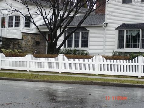 Stepped White Wood Picket Fence Wood Picket Fence Wood Fence