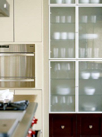 You can install frosted glass into any cabinet door. Glass-Front Cabinetry | Glass cabinet doors, Glass kitchen ...