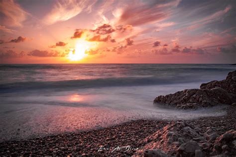 Those Mesmerizing Sunsets Are Back 🌅 Sunset Beach Colors Rocks