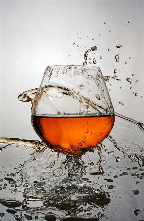 Splash In Glass Of Cognac Stock Photo Image Of Color 89684844