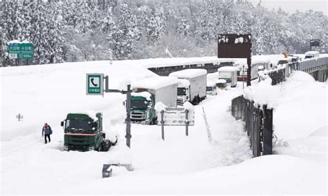 Record Snowfall In Japan Forces Hundreds Of Drivers To Sleep In Their