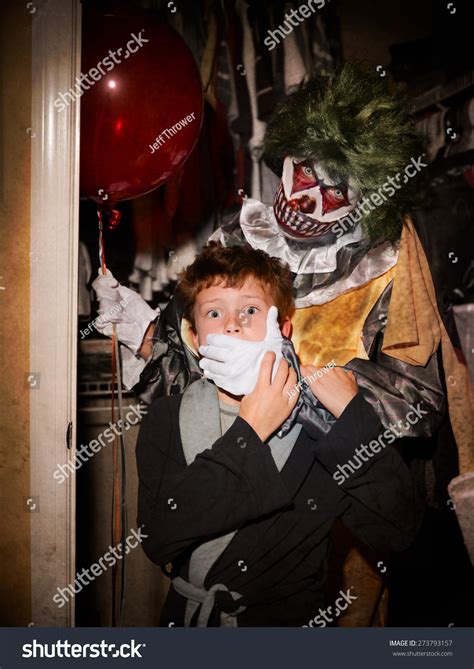 Scary Clown Standing Behind Scared Child Stock Photo 273793157