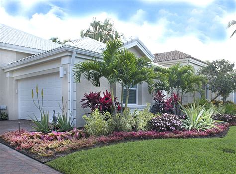 Colorful Bromeliads And Agaves Adorn This Lovely Palm Beach Gardens
