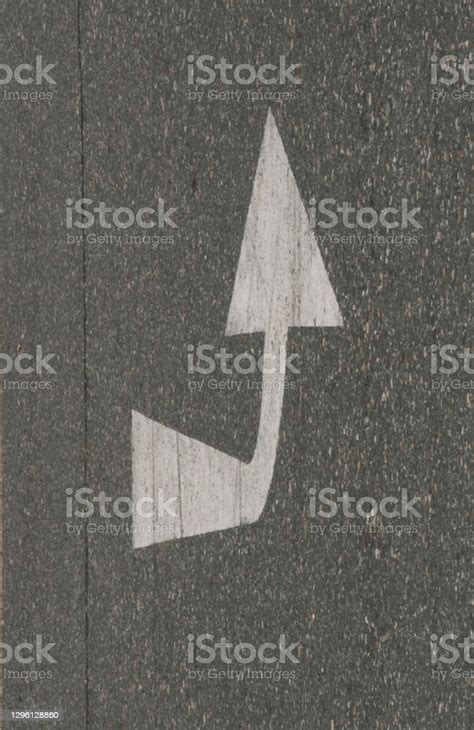 Direction Arrow Points In One Way Stock Photo Download Image Now