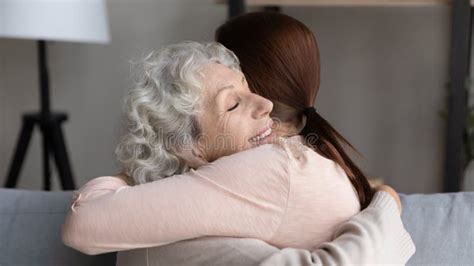 Happy Senior Mom And Adult Daughter Hugging Stock Image Image Of Love