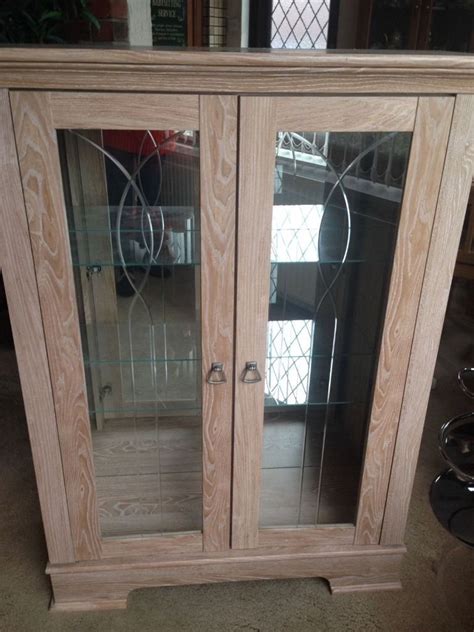 Limed Oak Display Cabinet With Glass Doors And Interior Light In