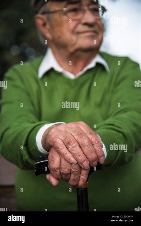 Senior Man With Walking Stick Stock Photo Alamy