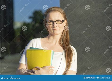 Middle Aged Woman With Documents In Hands Smart Business Lady Businesswoman Thoughtful