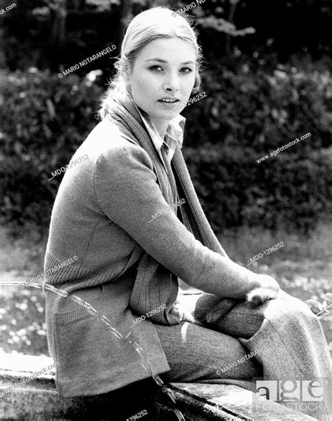 Portrait Of Janet Agren In A Garden Portrait Of Swedish Actress Janet Agren Sitting On The Edge