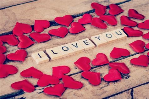 Premium Photo Close Up Wooden Text For I Love You And Red Heart On Wood Background
