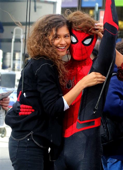 Zendaya and tom holland in spiderman suit swing into action up in the air as they are lifted with wires while filming spiderman Pin by Shay Meyer on tom holland, archives | Tom holland ...