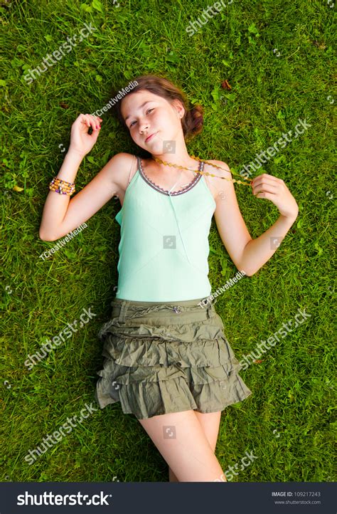 Teen Girls Laying Down Teenage Girl Lying Down With Leaves Around Stock Image Image Of