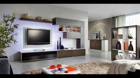 Our biggest challenge by far was the wall with the 65″ tv on it. Modern TV Wall Unit Design Tour 2018 DIY Small Living Room ...