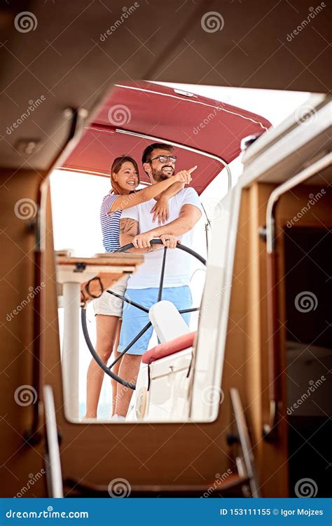 Girl Enjoying A Summer Day On A Boat With Her Boyfriend Stock Image