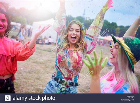 Friends Dancing During Music Festival Colour Powder Stock Photo Alamy