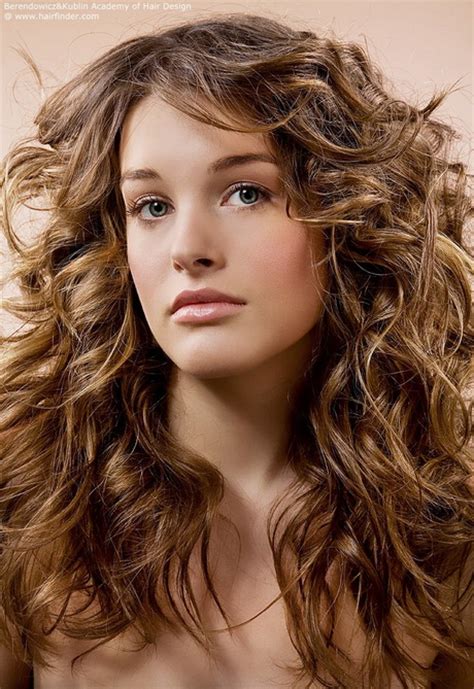 There is no one way to wear your hair wavy—you can opt for loose, beachy texture, tighter curls, or but if you have thick, wavy hair, you too can have this look. Layered haircuts for curly hair