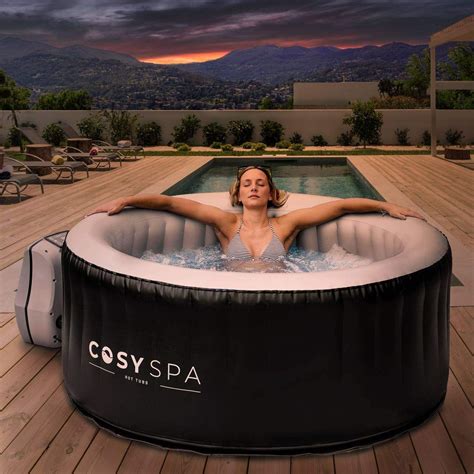 A Woman Is Relaxing In An Outdoor Hot Tub