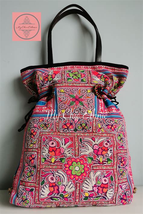 Bags made from Hmong Baby Carriers. Hmong mothers express their love ...