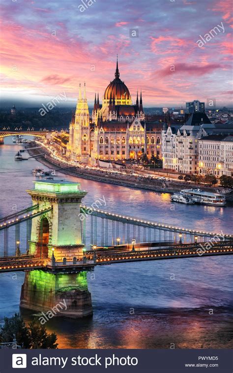 Chain Bridge On Danube River And Hungarian Parliament At Sunset Hi Res