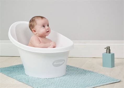 There are feet on the bottom which grip the base of a sink or bathtub. The purpose of a baby bucket bath tub