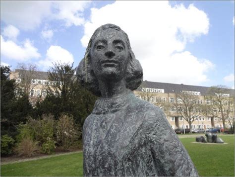 Statue Of Anne Frank Located At The Merwedeplein In Amsterdam