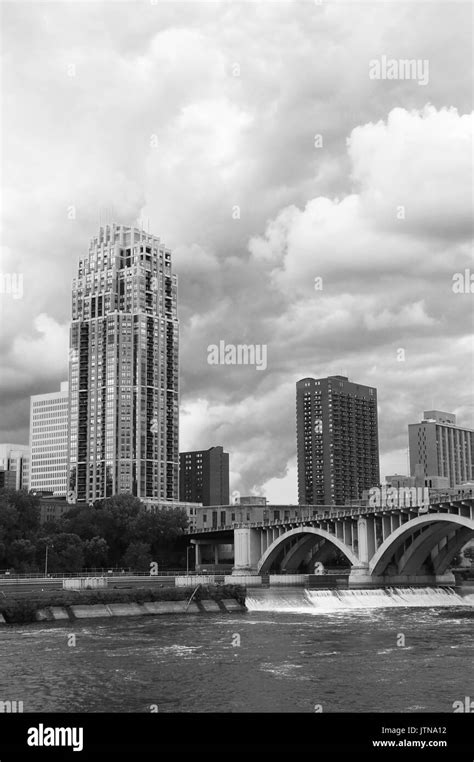 Minneapolis Downtown Skyline And Third Avenue Bridge Above Saint