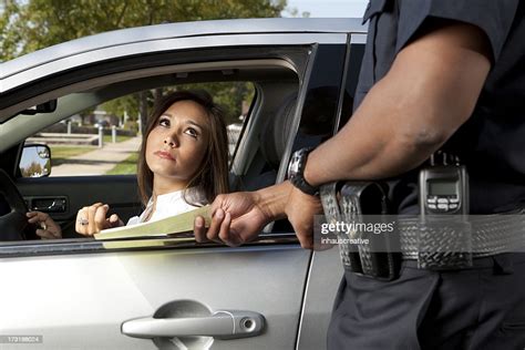 Police Officer Giving A Ticket High Res Stock Photo Getty Images