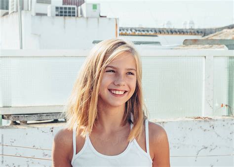 Laughing Teen Posing At Camera By Stocksy Contributor Vera Lair