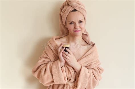Beautiful Young Woman In Towel On Head And Bath Robe Drinking Coffee Morning At Home Stock