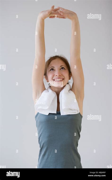 Woman Stretching Arms Over Head Hi Res Stock Photography And Images Alamy