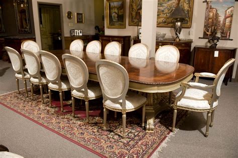 Rounding out the design, the architectural pedestal base includes four angular legs that give this piece a touch of industrial style. Mahogany Dining Table and 12 Chairs Set at 1stdibs