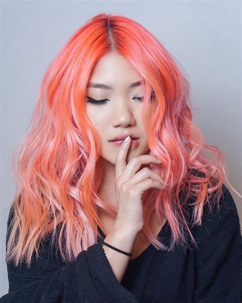 Neon Peach Hair Is Instagrams Biggest Summer Hair Color Trend Allure