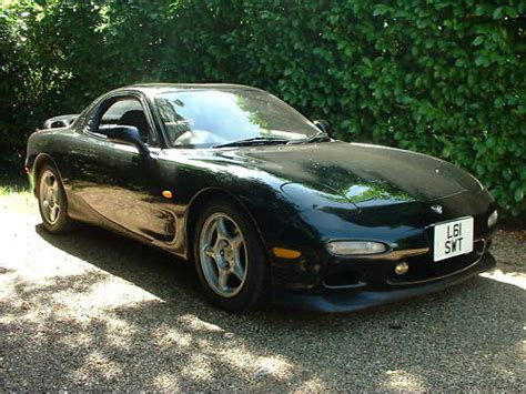 Every car enthusiast has a list of dream cars he or she obsessed over at an early age. 1993 Mazda RX-7 Version 2 Touring S