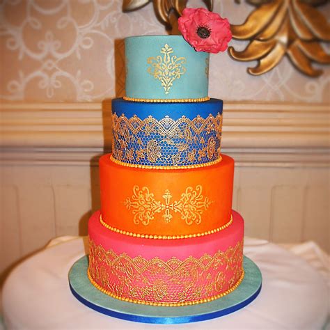 A Vibrant Indian Wedding Theme Cake Decorated With Stencilled Gold