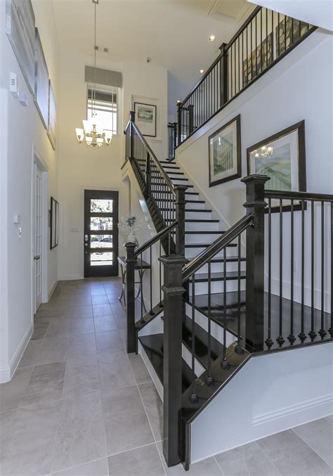 Gehan Homes Stairway Black Hardwood Tread White Risers L Shaped