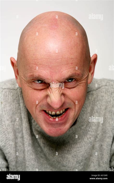 Studio Shoot Of Angry Bald Man Stock Photo Alamy