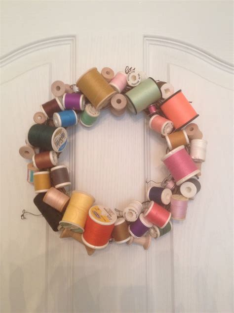 Glue Old Thread Spools On A Grapevine Wreath And Fill In Small Spots