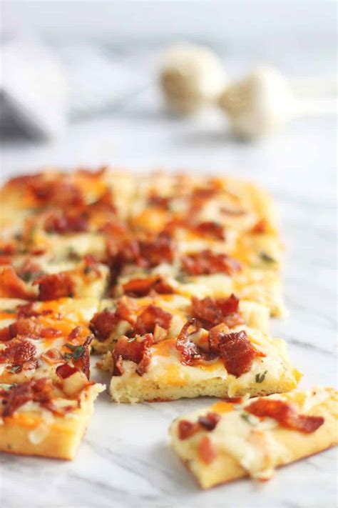 These keto breadsticks will knock your socks off this easy, cheesy, garlicky, delicious keto recipe is made with just 4 simple ingredients: Keto Cheesy Bacon Garlic Bread | Low Carb Appetizer Recipe