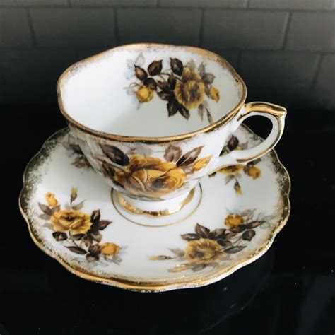 Vintage Tea Cup And Saucer Fine Bone China Golden Yellow Roses With