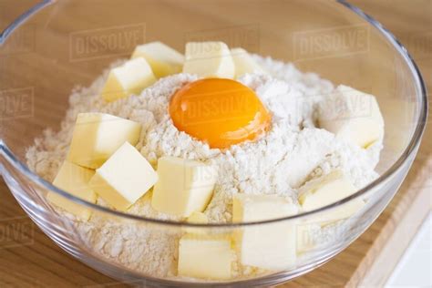 Flour Egg And Butter In A Bowl Stock Photo Dissolve