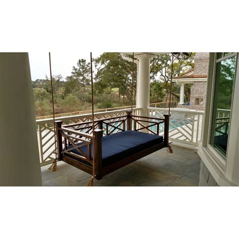Porch swing constructed from old doors and newel posts. Custom Carolina The Classic Columbia Porch Swing | Wayfair.ca