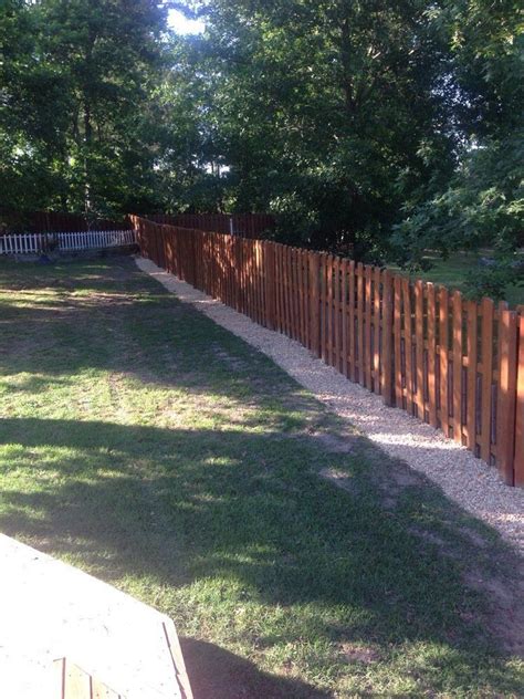 Use Rocks Gravel Or Sand For Mowing Strip Along Fence Landscaping