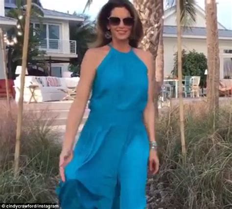 Cindy Crawford Wears Cerulean Blue Gown While Shooting Commercial In Florida Daily Mail Online