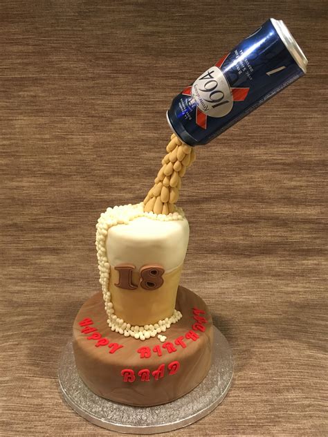 A Birthday Cake With A Soda Can Pouring Into It