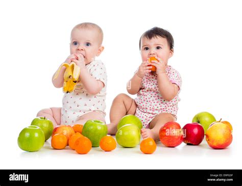 Babies Eating Fruits Stock Photo Alamy