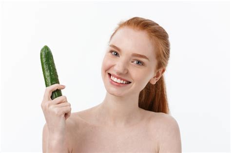Premium Photo Cheerful Happy Beautiful Girl With Cucumber On Her Hand